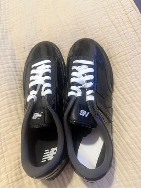 New Balance Black and White Patent Leather Low-Top Sneakers